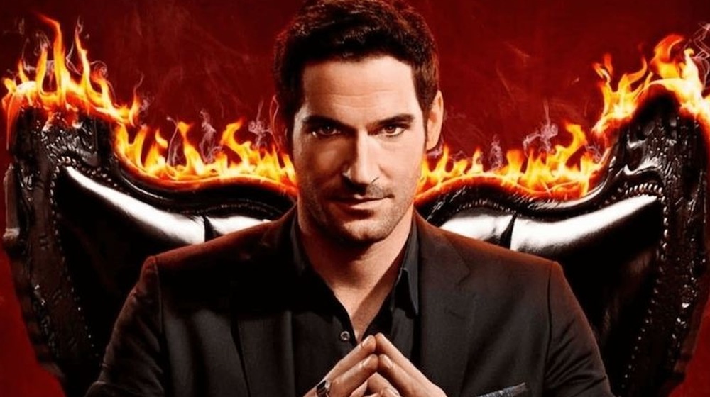 Lucifer Morningstar seated in a flaming chair