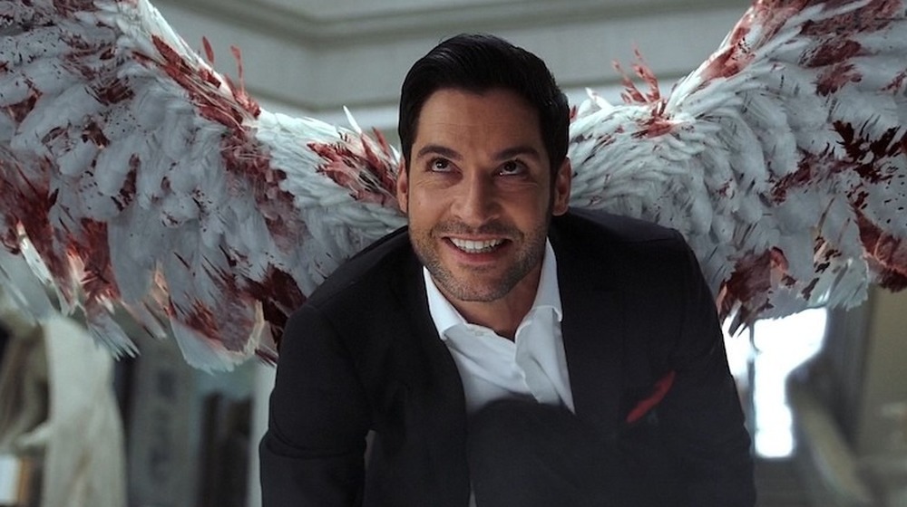 Lucifer Morningstar smiling with bloody wings