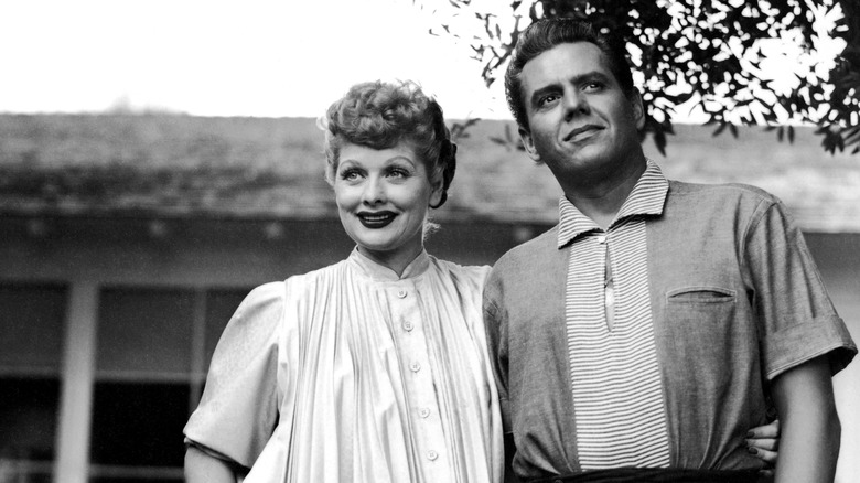 Lucy and Desi posing together at home