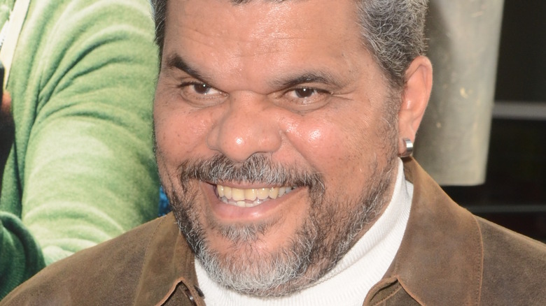 Luis Guzman smiling