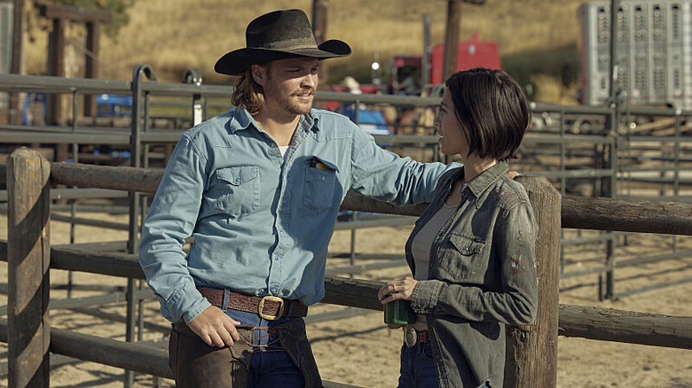 Kayce and Monica Dutton talk by a fence on "Yellowstone"