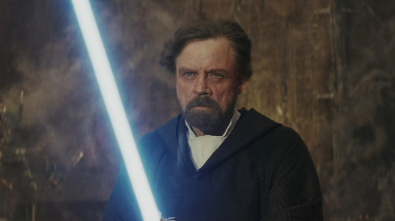 Luke Skywalker wielding a lightsaber