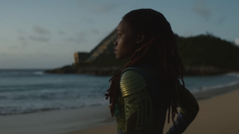 Lupita Nyong'o stares out at the ocean