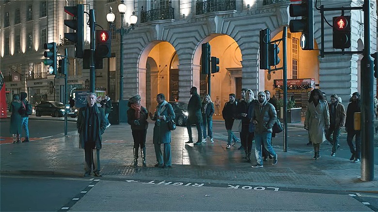 crowd standing at Piccadilly Circus 