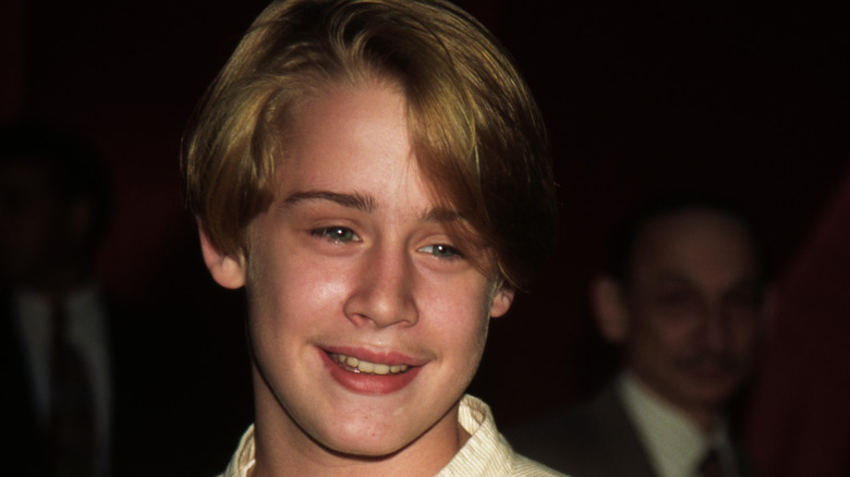 Macaulay Culkin smiling