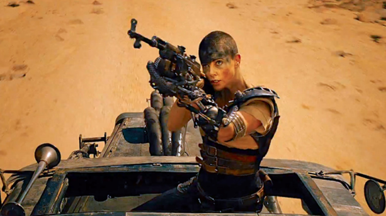 Furiosa aiming a gun