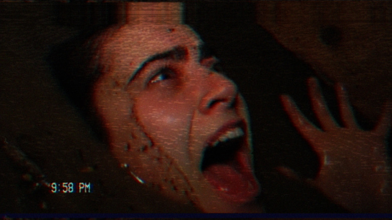 Girl screaming in "Suicide Bid" in "V/H/S/99"