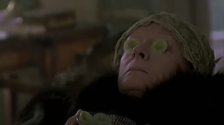 Maggie Smith with cucumbers over eyes