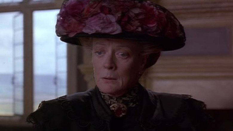 Maggie Smith as upset Mrs. Medlock