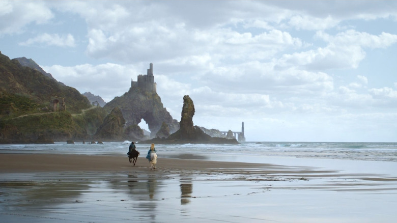 Elendil and Galadriel riding on the beach