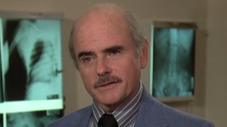 Glenn Cannon as Dr. Ibold in "Magnum, P.I."