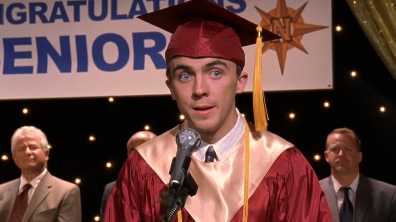 Malcolm speaking at graduation