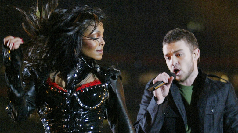 Janet Jackson looking back over shoulder at Timberlake