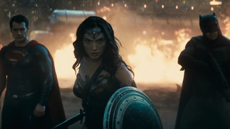 Superman, Batman and Wonder Woman stand together