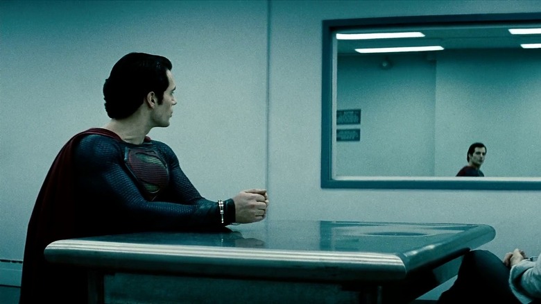 Superman looks into the glass