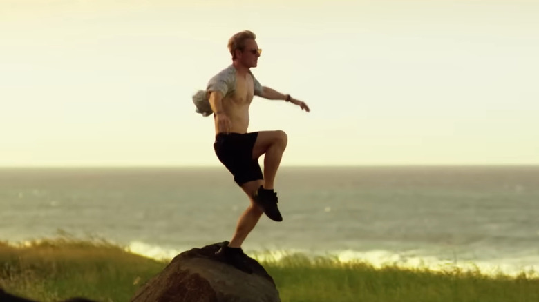 Thomas balancing on a rock