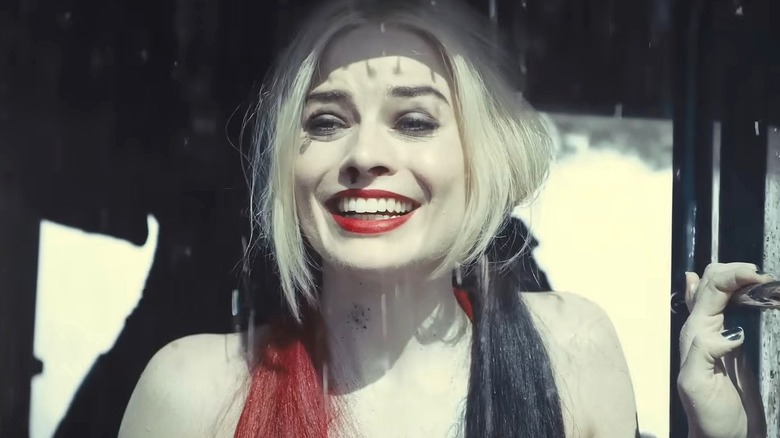 Harley Quinn looks away from camera