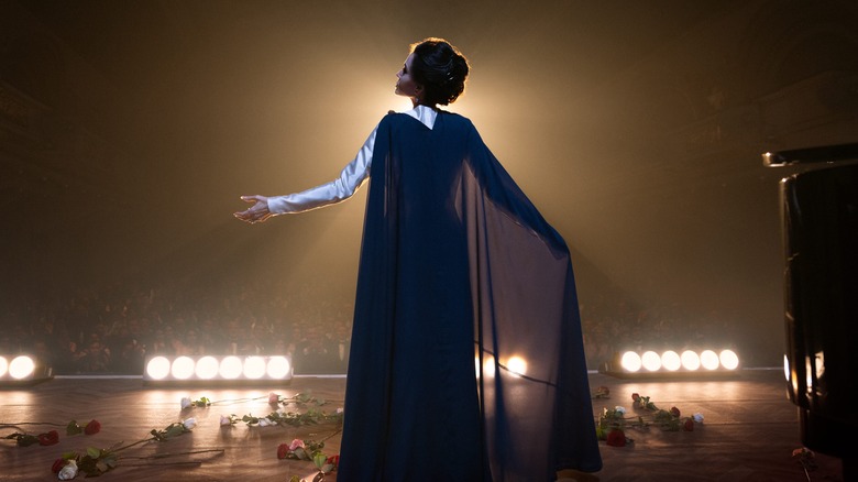 Maria posing on stage