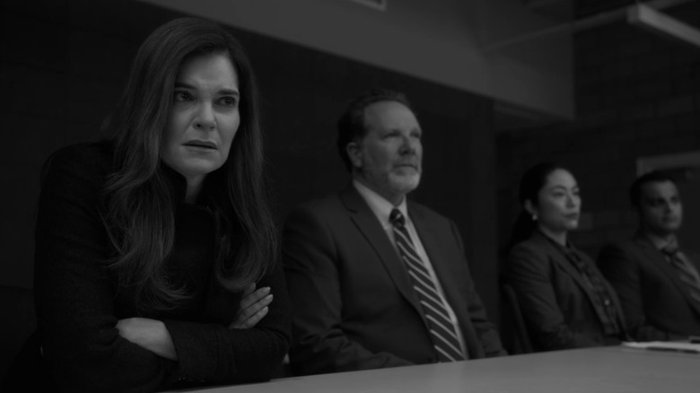 Marie Schrader sitting with the prosecution against Saul Goodman