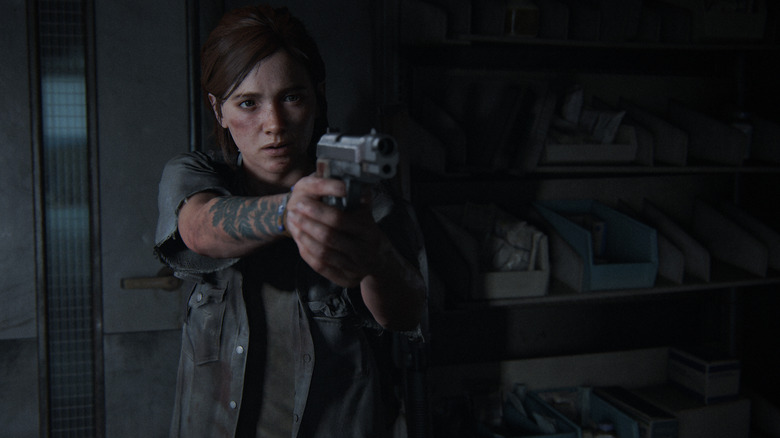 Ellie holding a gun