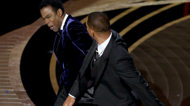 Will Smith slapping Chris Rock.