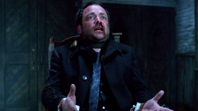 Crowley bloodied and tied up