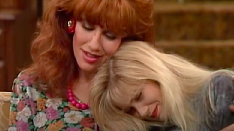 Peg and Kelly hugging