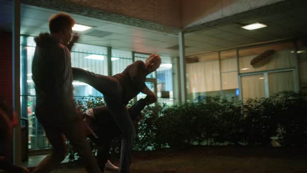 Johnny takes on a group of bullies on Cobra Kai