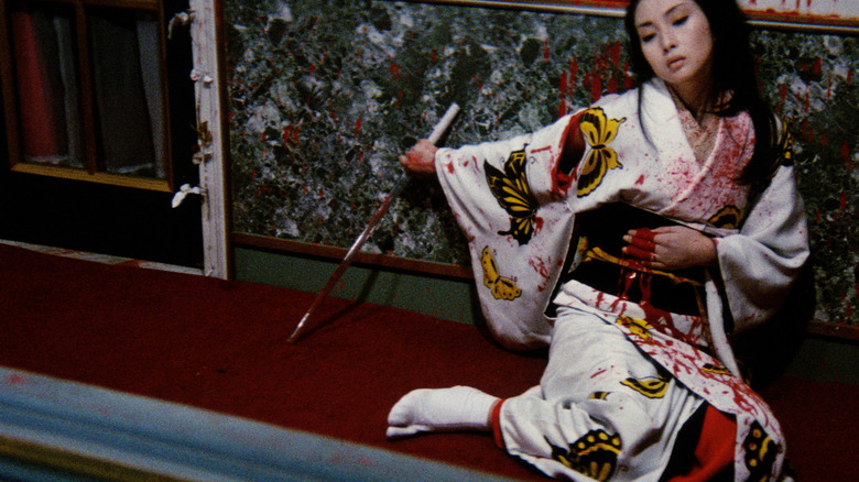 Meiko Kaji bleeding with sword