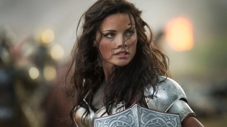 Lady Sif in battle holding a shield 