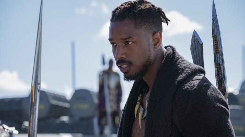 Killmonger in Wakanda with spear on his back