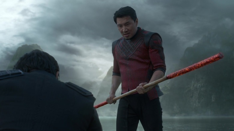 Shang-Chi holding a staff