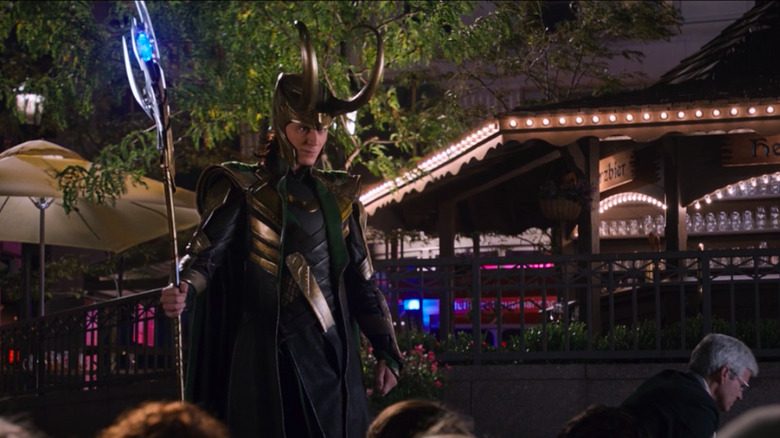 Loki hovers over cowering crowd 