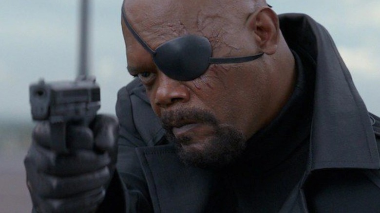 Nick Fury aiming a gun