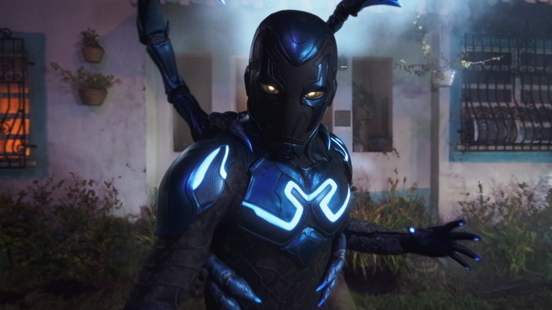 Blue Beetle prepares to attack