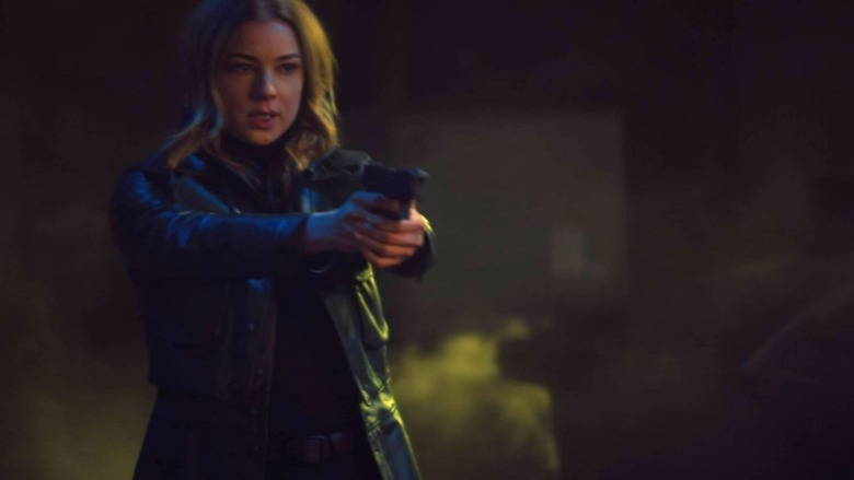 Sharon Carter pointing gun