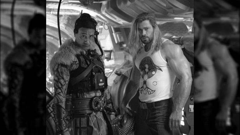 Chris Hemsworth and Taika Waititi on set