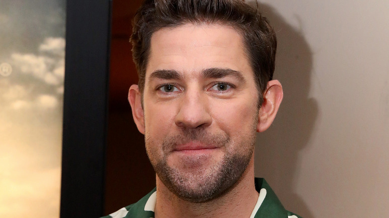 John Krasinski smiles at camera