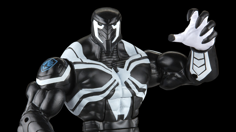 Space Knight Venom figurine with his clawed arm raised