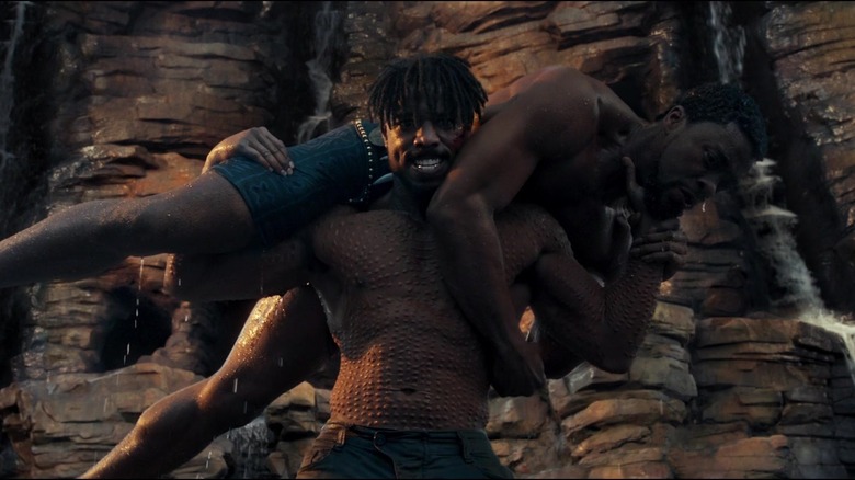 Killmonger throws T'Challa off a cliff.