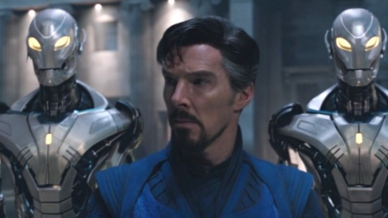 Doctor Strange being escorted by two Ultron bots