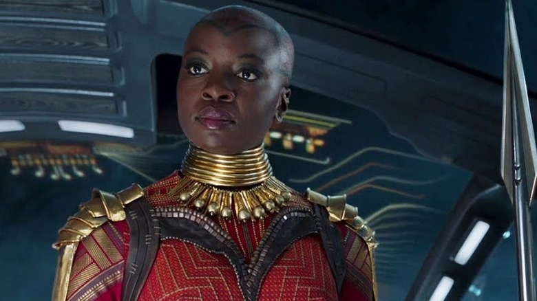 Okoye stands tall with a spear