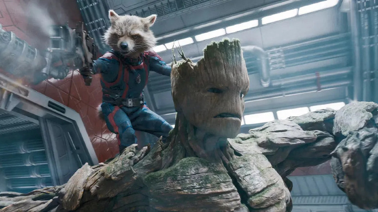 Rocket and Groot fighting in hallway