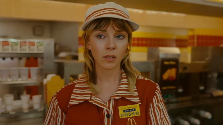 Sylvie in McDonald's uniform