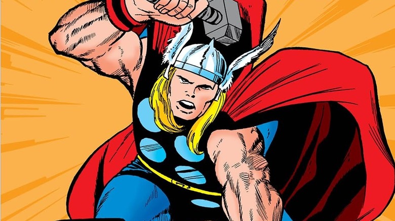 Thor holding hammer over head