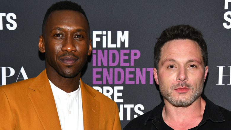 Mahershala Ali and Nic Pizzolatto smirking