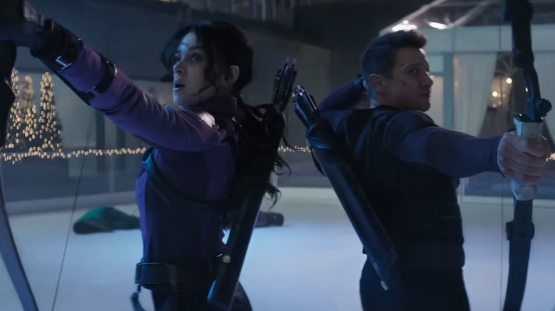 Hawkeye and Kate shooting bows