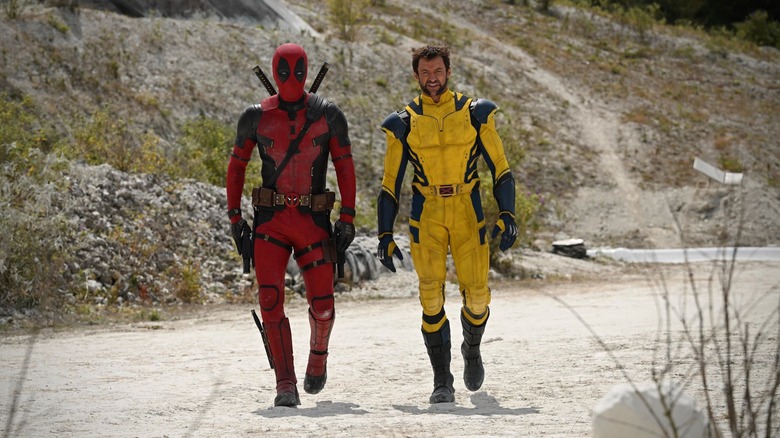 Deadpool and Wolverine on sand