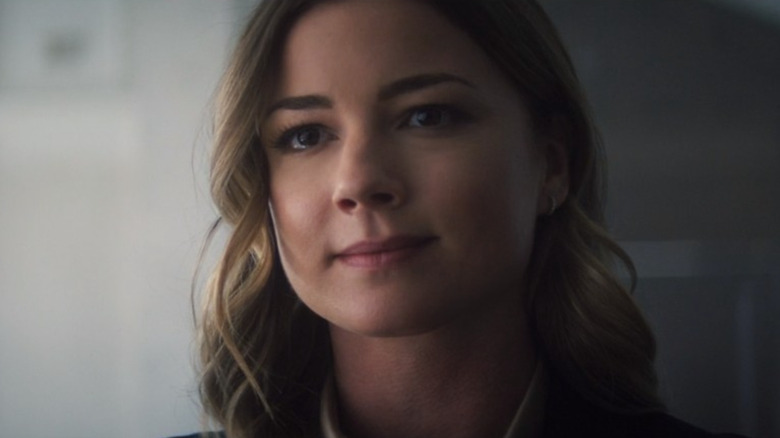 Emily VanCamp smirking