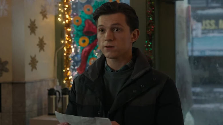 Tom Holland with a letter